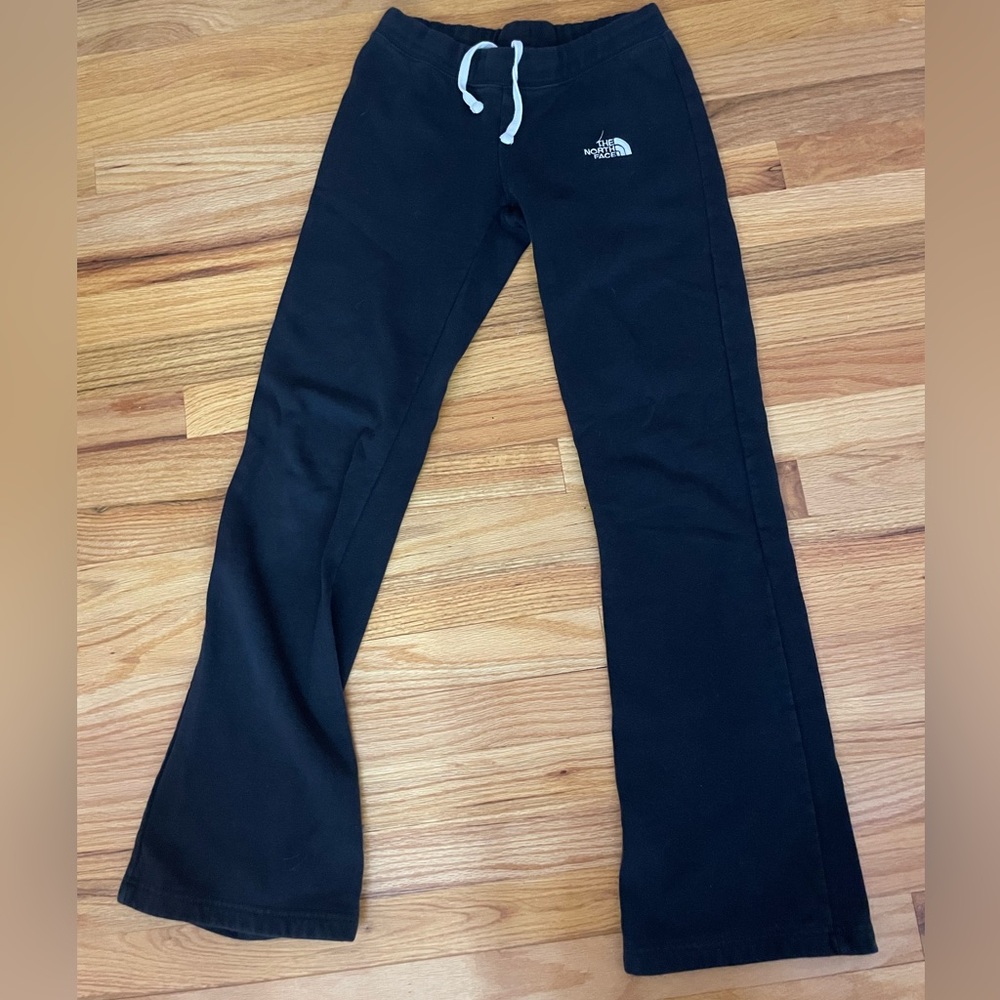 Slightly flared black North Face sweatpants